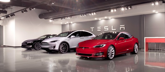 Model S and Model X vehicles in a showroom