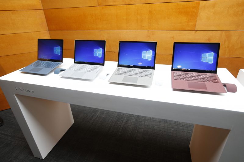 A series of Microsoft Surfaces are displayed at one of its retail stores