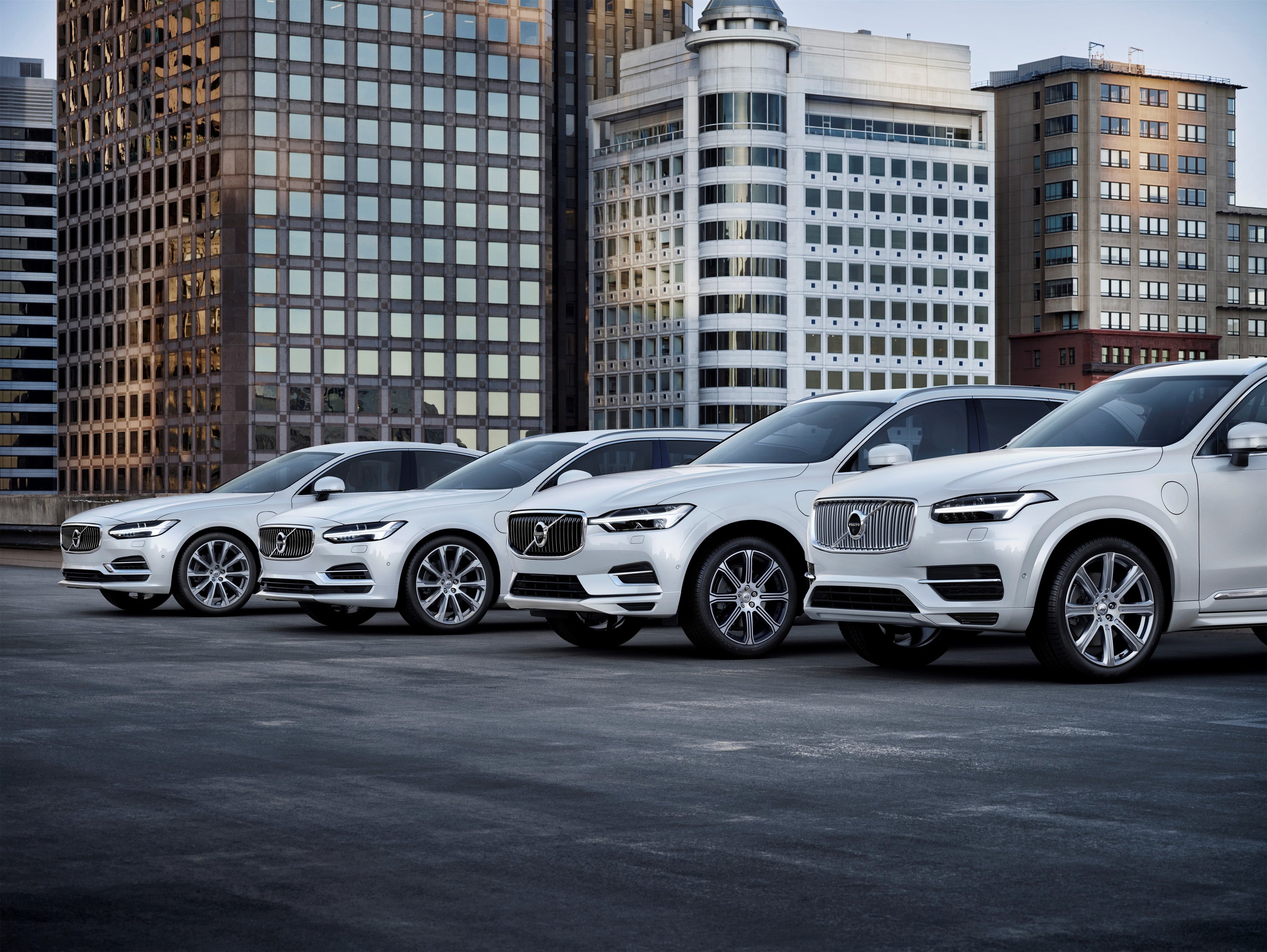 Four Volvo plug-in hybrid vehicles.