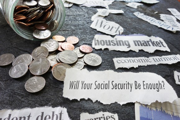 A change jar surrounded by Social Security headlines.