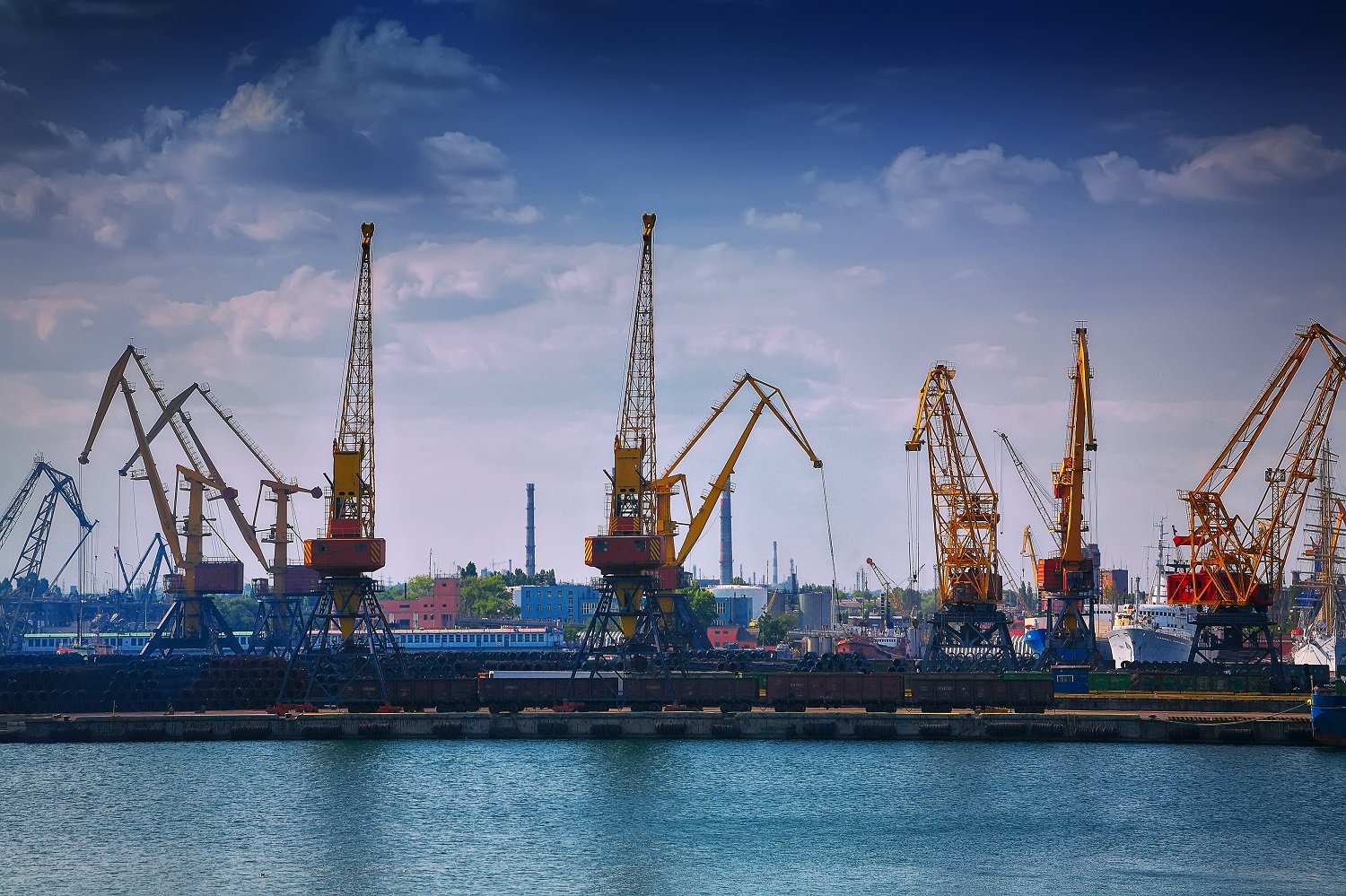 Cranes operating at a sea port.