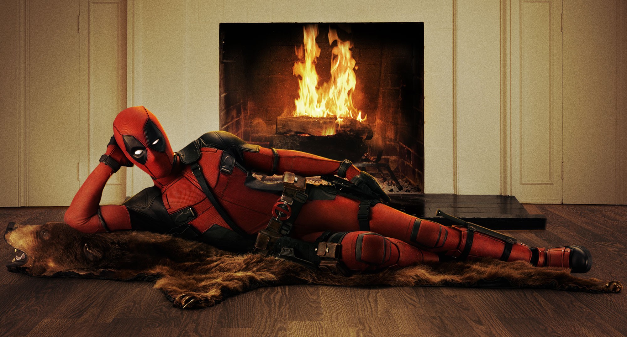 Deadpool lies on a bearskin rug.