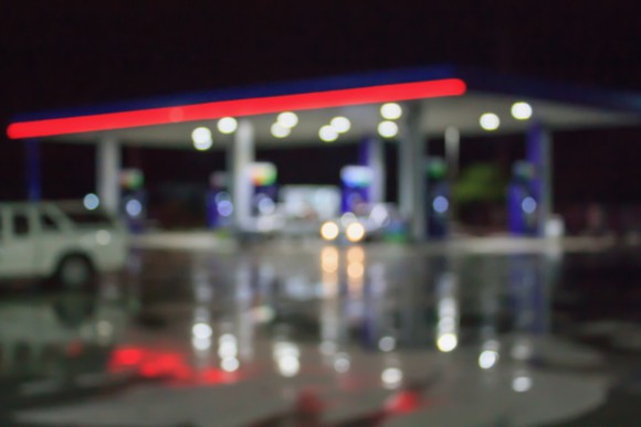 Blurred photo of a gas station.