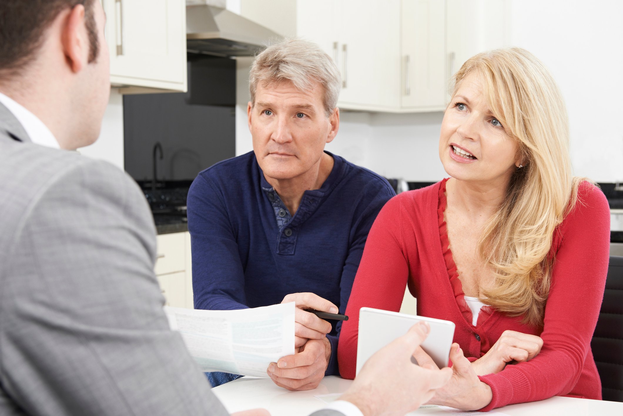 Couple meeting with a retirement planner.