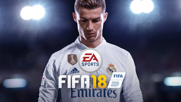 Game box art of real-life soccer player wearing uniform, stadium lights in the background, with the title FIFA 18 centered in the middle.