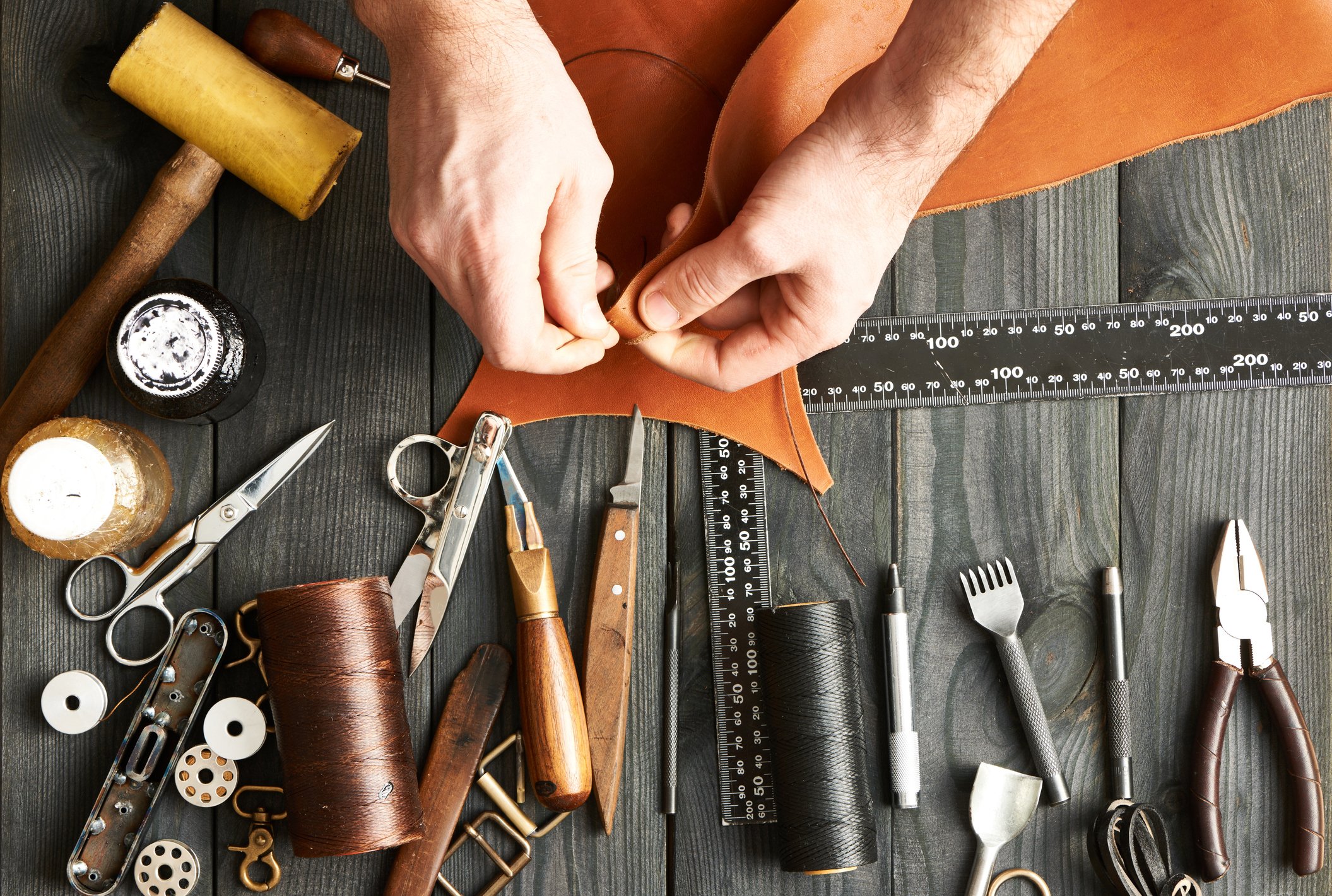 Craftsman working on a leather product