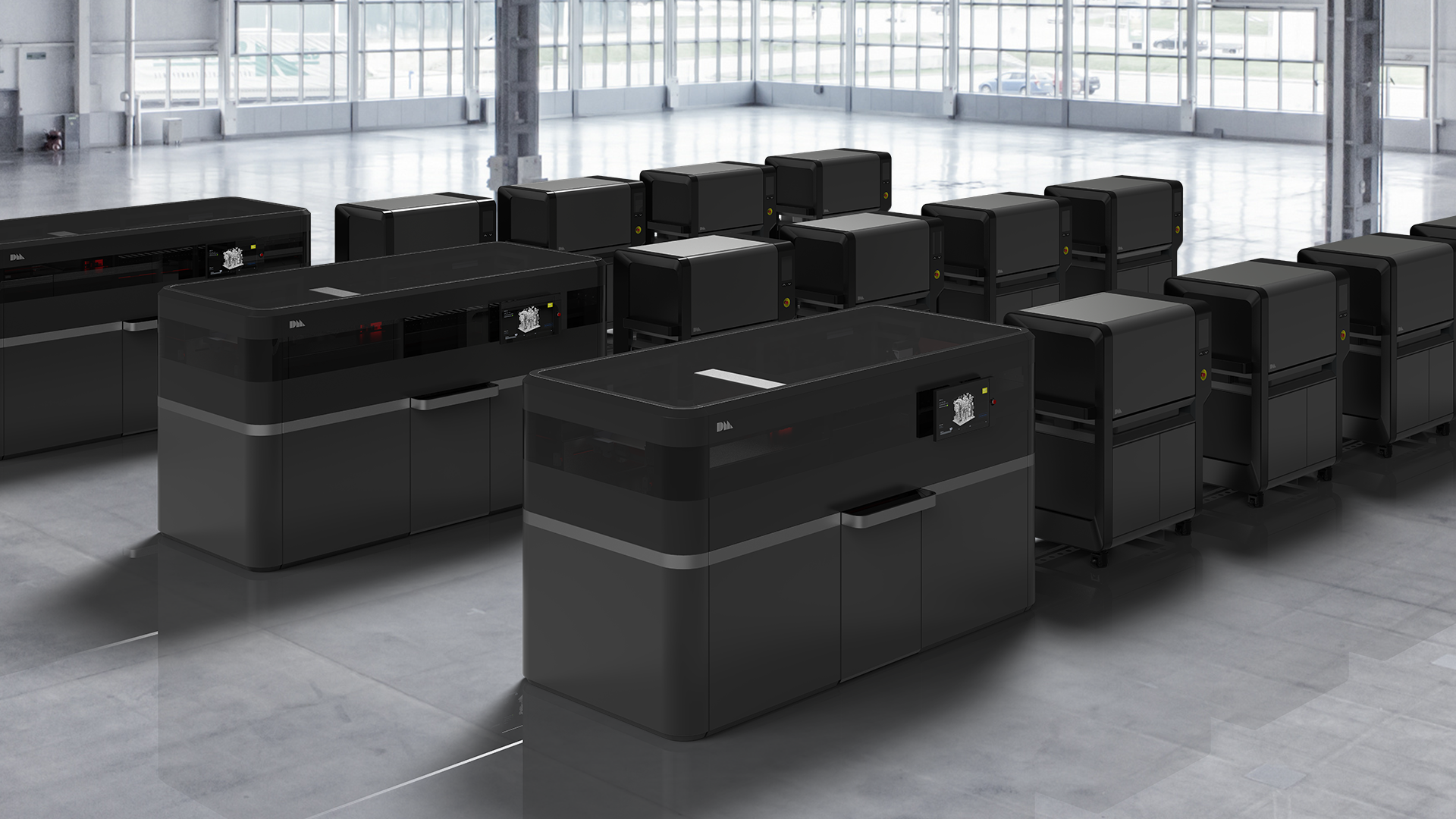 several units of DM Production System in a large room.
