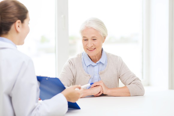 Doctor with elderly patient.