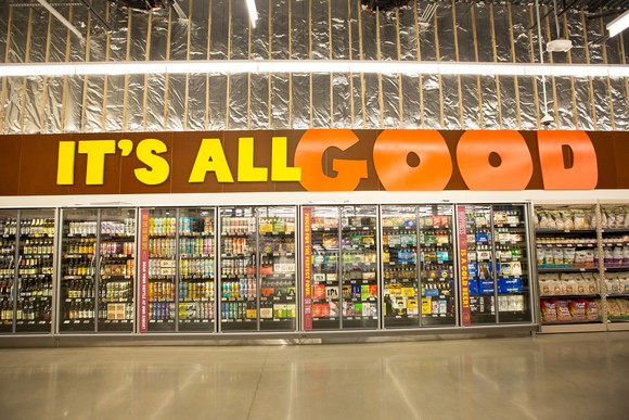 Interior shot showing refrigerated beer cases.
