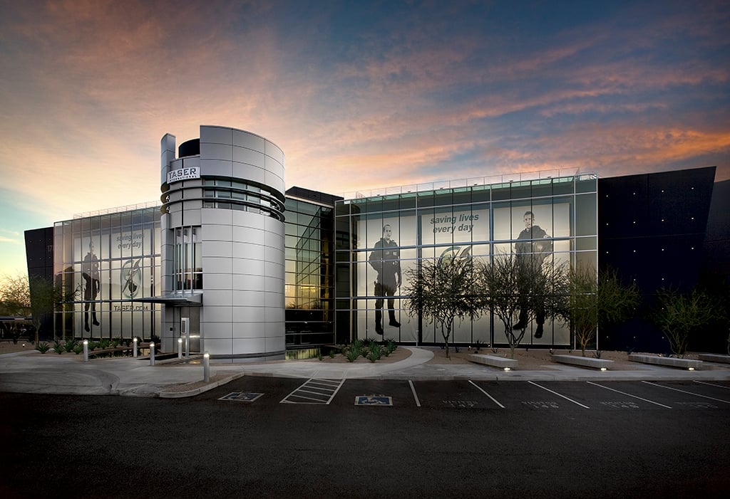 Axon's headquarters with the setting sun in the background.
