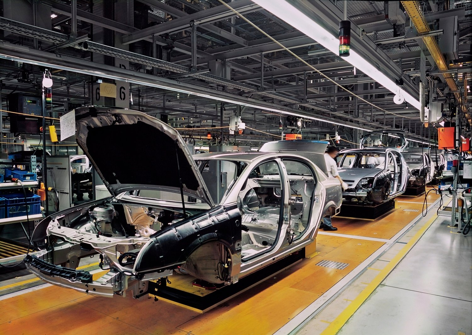 Steel car frames in an auto plant.