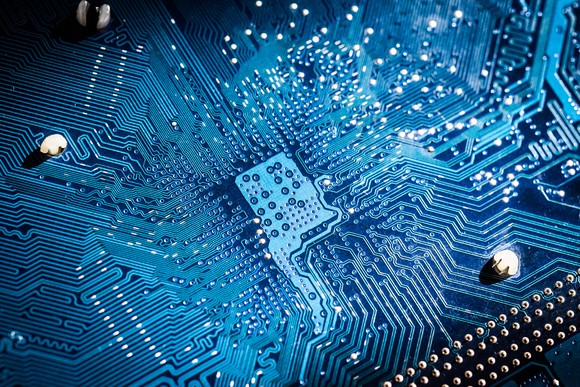 Circuit board under blue lights.