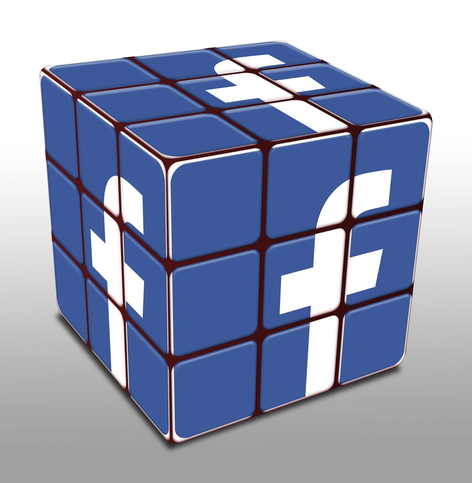 An all-blue Rubik's Cube, with the Facebook "f" logo on every side.