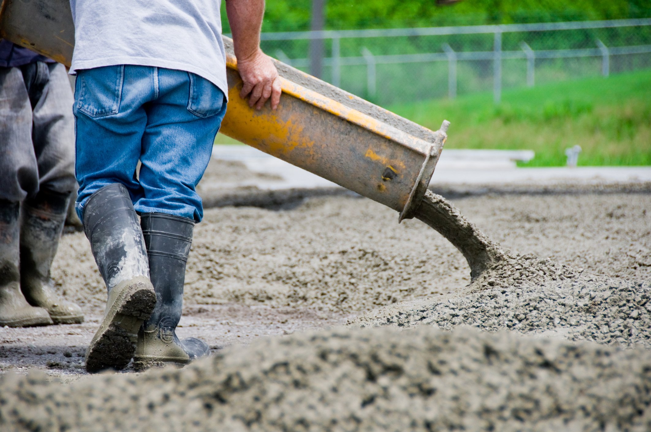 Pouring a slab of cement.