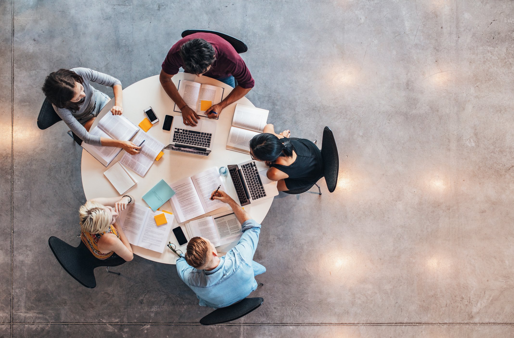 Students studying around a table