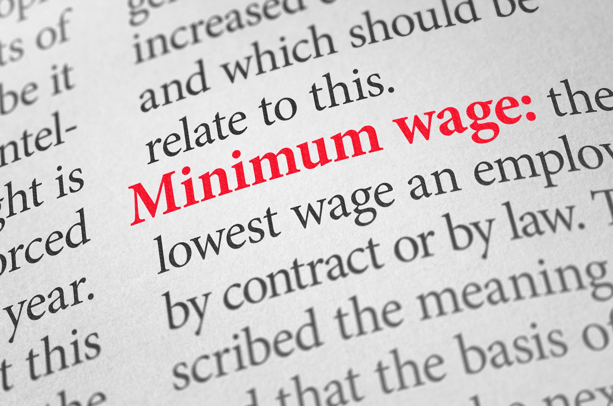 close up of dictionary entry for "minimum wage"