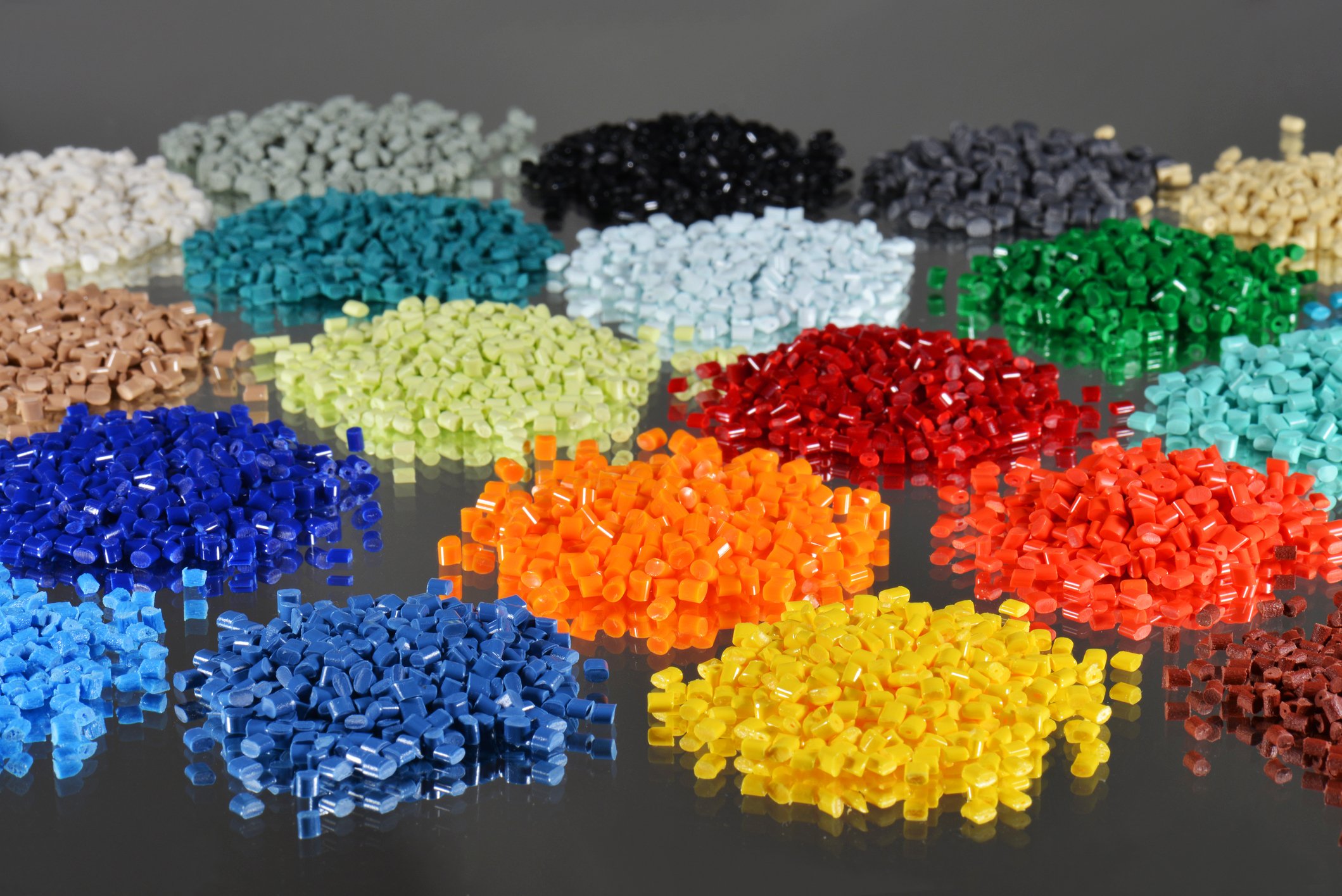Piles of different-colored plastic resin beads