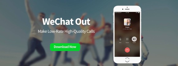 Blurry photo of people jumping with smartphone in foreground with quote "WeChat Out, Make low-rate high-quality calls -- download now."