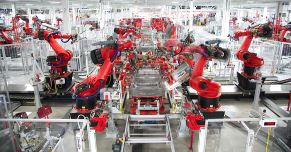 Robots manufacturing vehicles at Tesla's Fremont factory