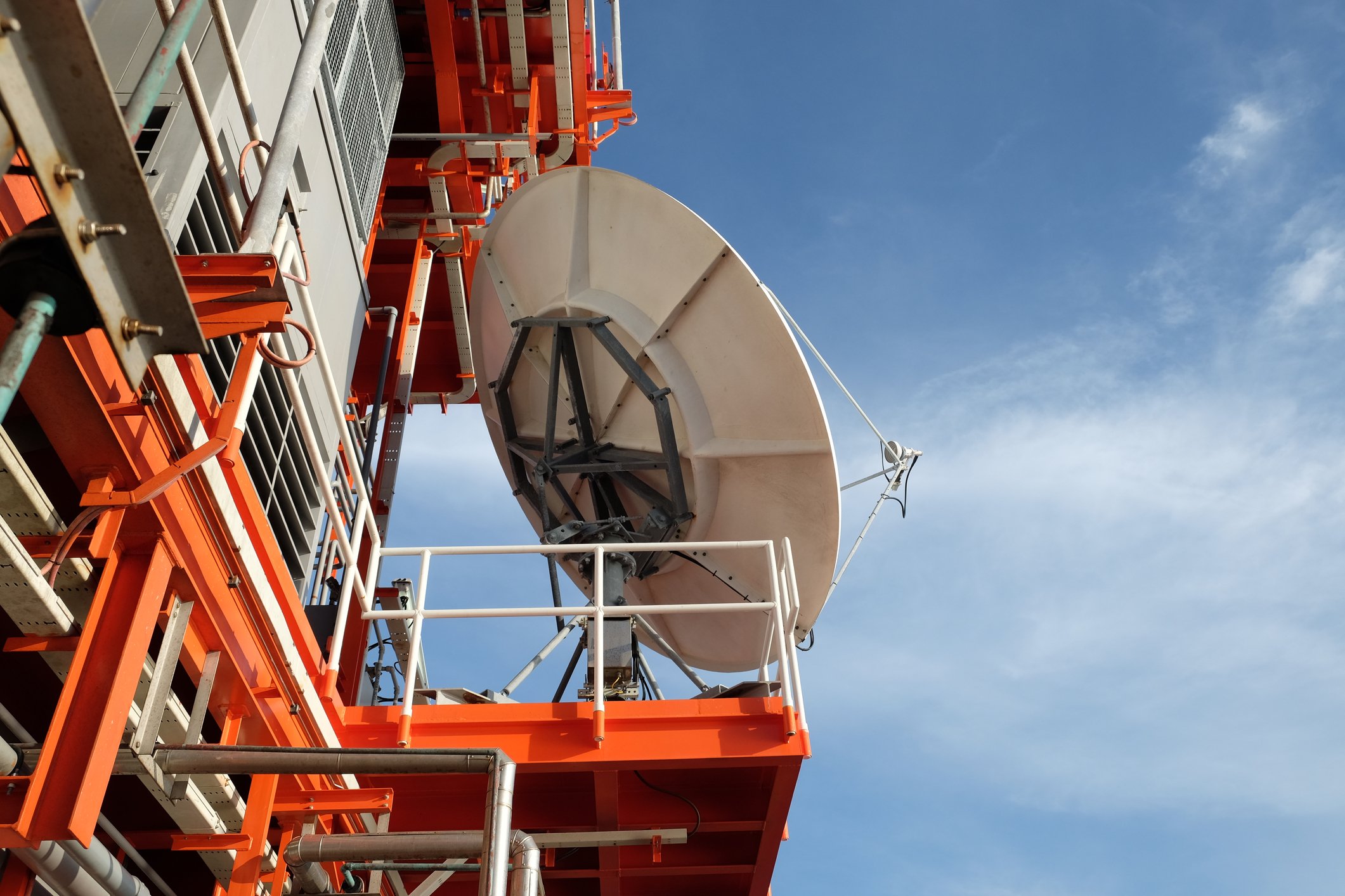 A satellite dish on an offshore oil rig.