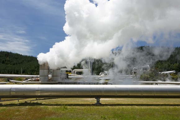 An operating geothermal power plant in daylight