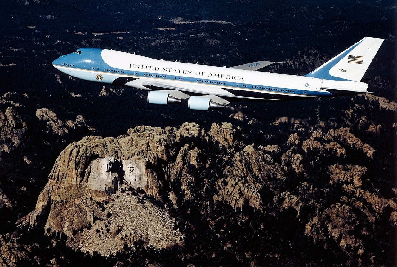 Air Force One flying over mountains