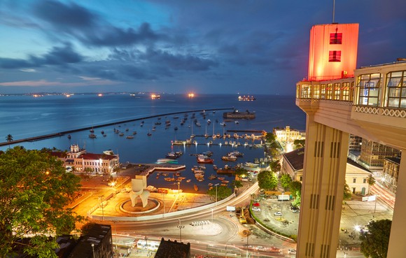 Nighttime view of Salvador City, from a high vantage point looking out into the city's harbor.