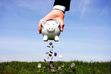 shaking money from piggy bank