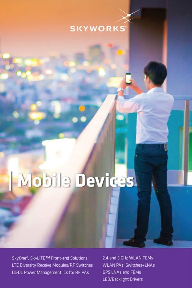 A man taking a picture on his smartphone.