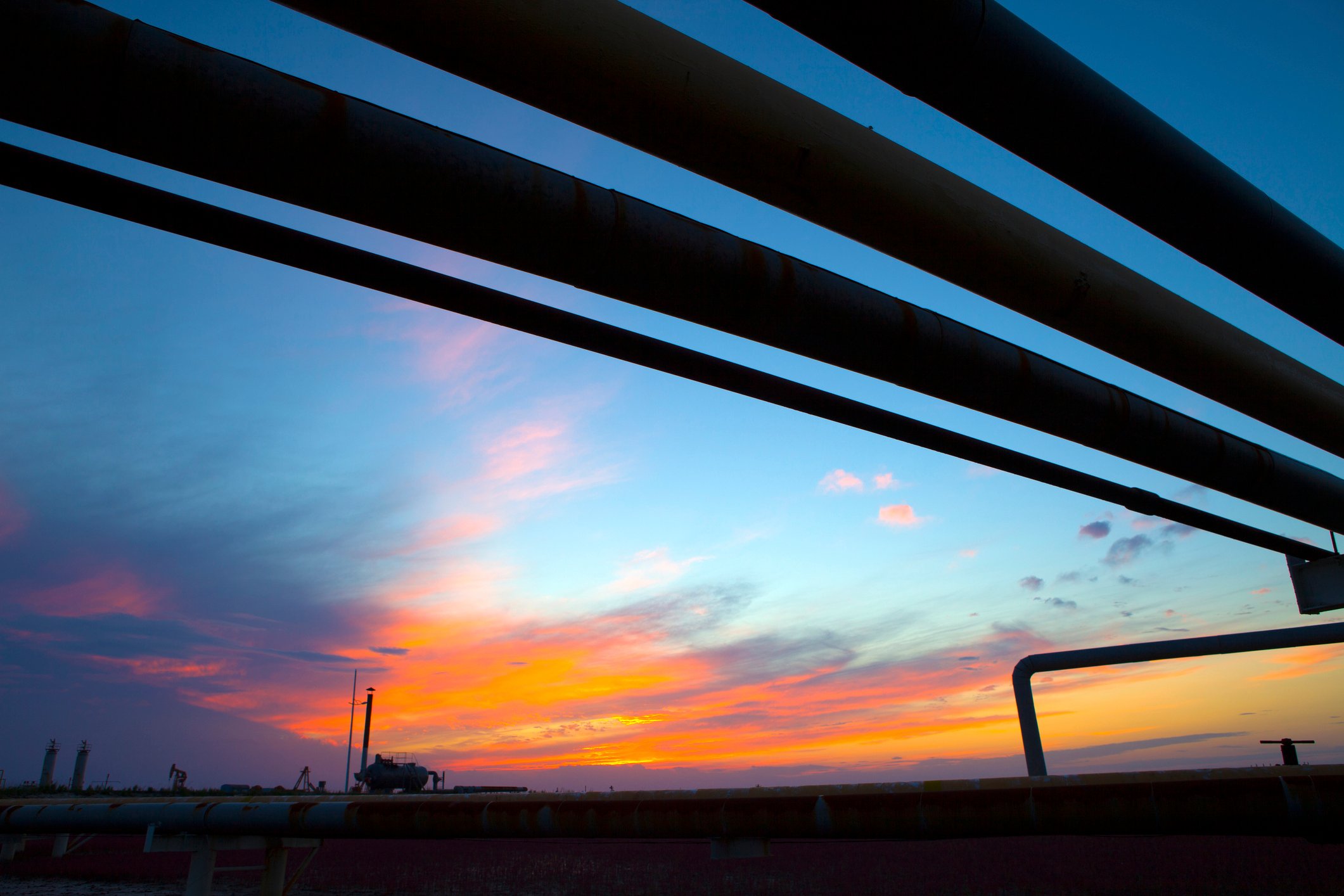 Oil pipelines at sunset.