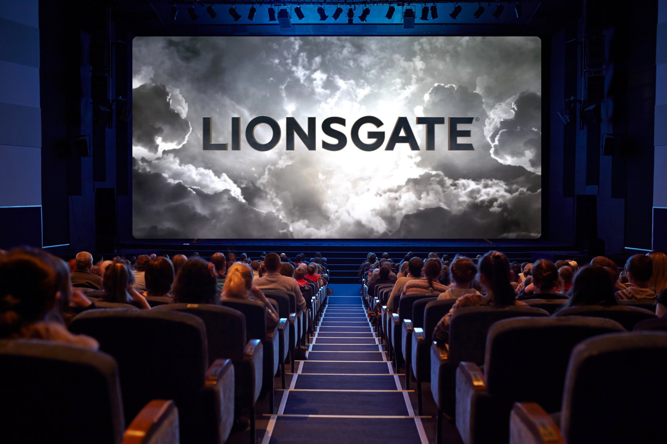 Packed movie theater with the Lionsgate logo being projected on the silver screen