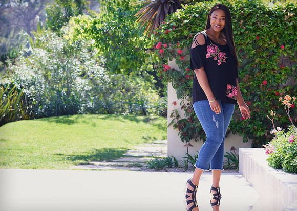 A woman wearing a Ross Stores outfit in a garden.