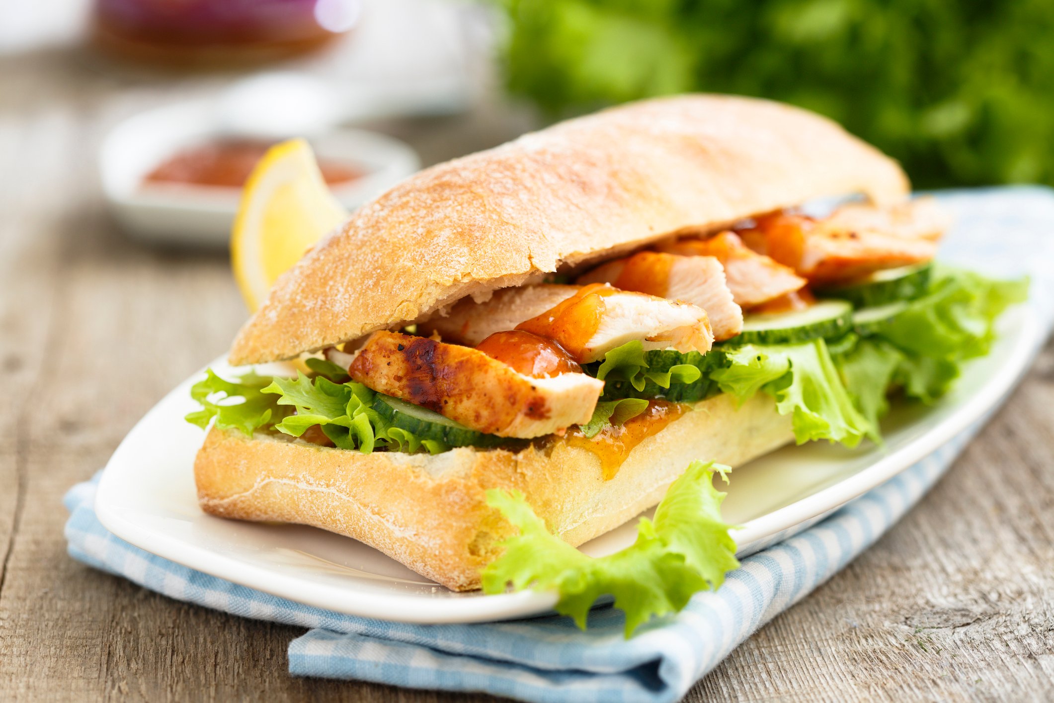 Grilled chicken sandwich with ciabatta bread.