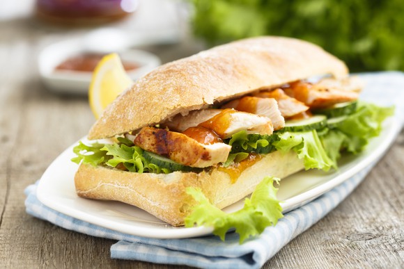 Grilled chicken sandwich with ciabatta bread.