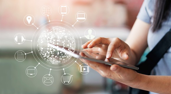 A person using a tablet to buy things online.