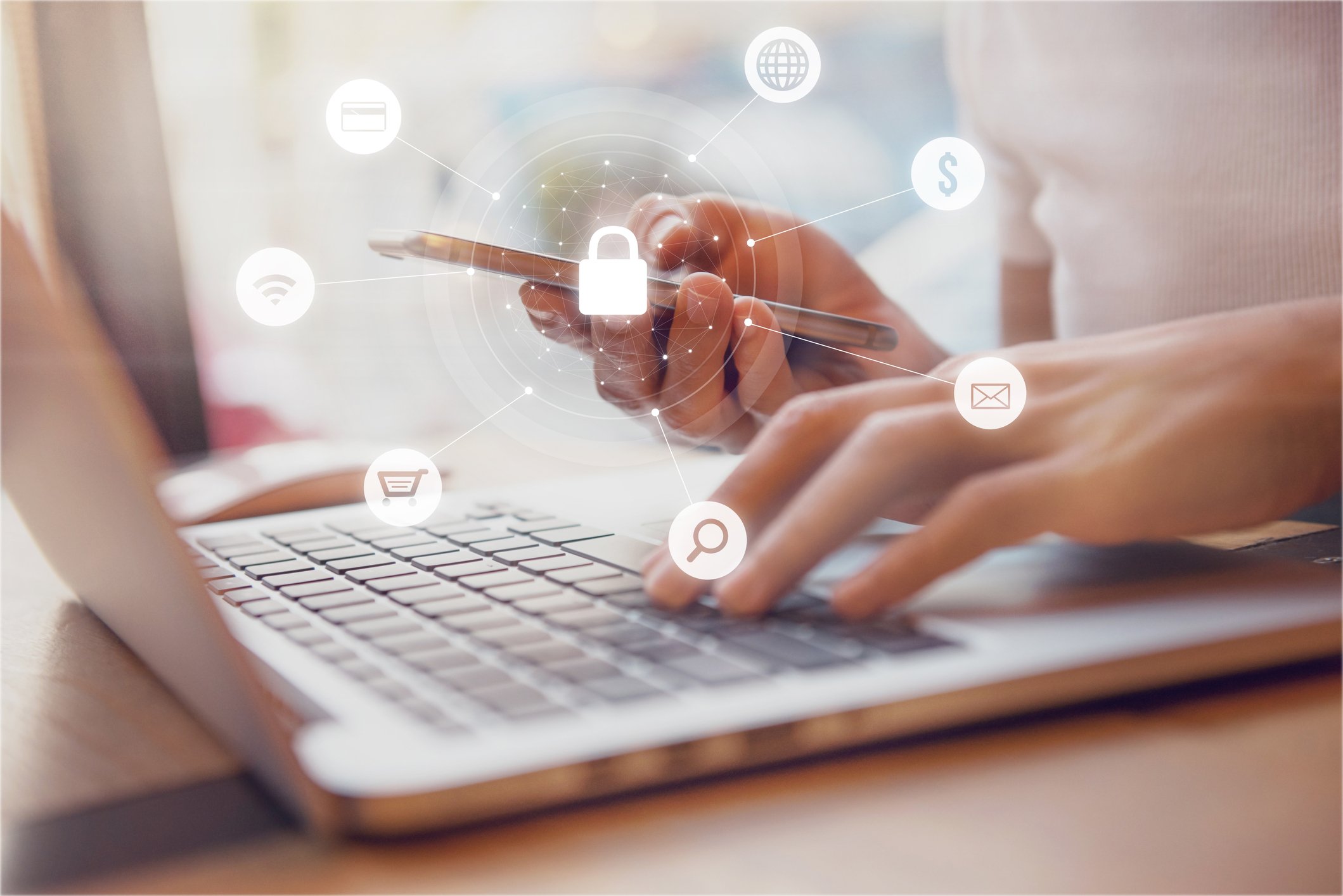 Person using internet with graphic of search and security icons overlaying the image. 