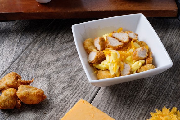 Chick-fil-A's new breakfast bowl with sliced chicken nuggets.