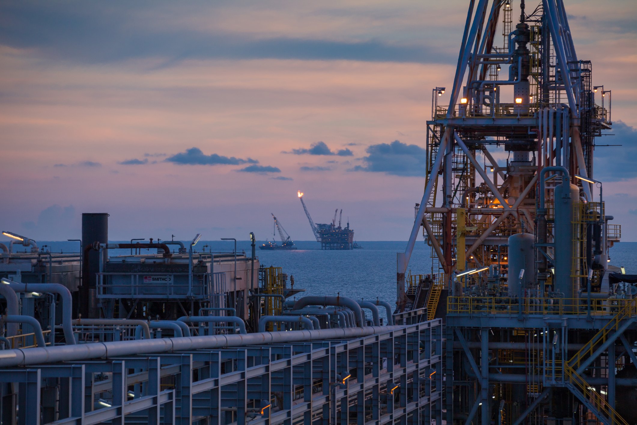 Floating production, storage, and offloading vessel at night.