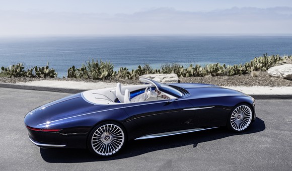 The Vision Mercedes-Maybach 6 Cabriolet, photographed near the ocean at an angle that shows its considerable length. 