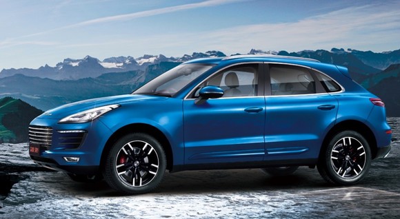 A blue Zotye SR9 SUV is shown on a snowy road.