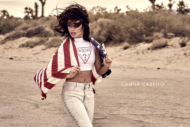 Woman with Guess shirt on wearing American flag