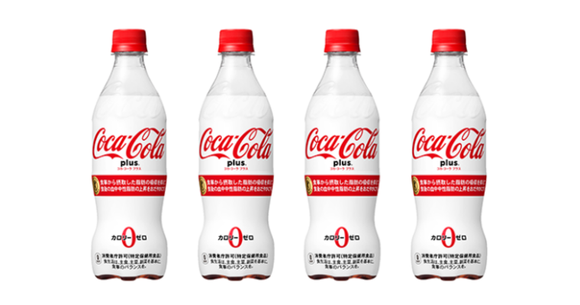 Line of four "Coca-Cola Plus" white and red Japanese beverage bottles.