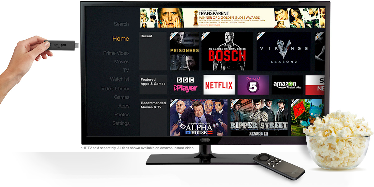 Amazon Fire TV Stick being inserted in TV