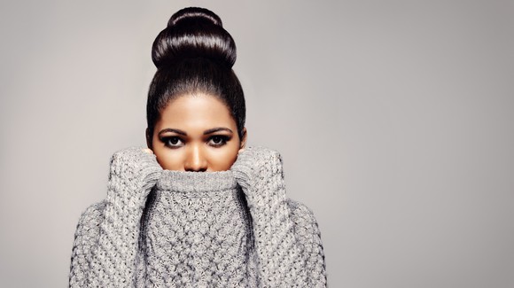 Glamourous woman in a luxury sweater