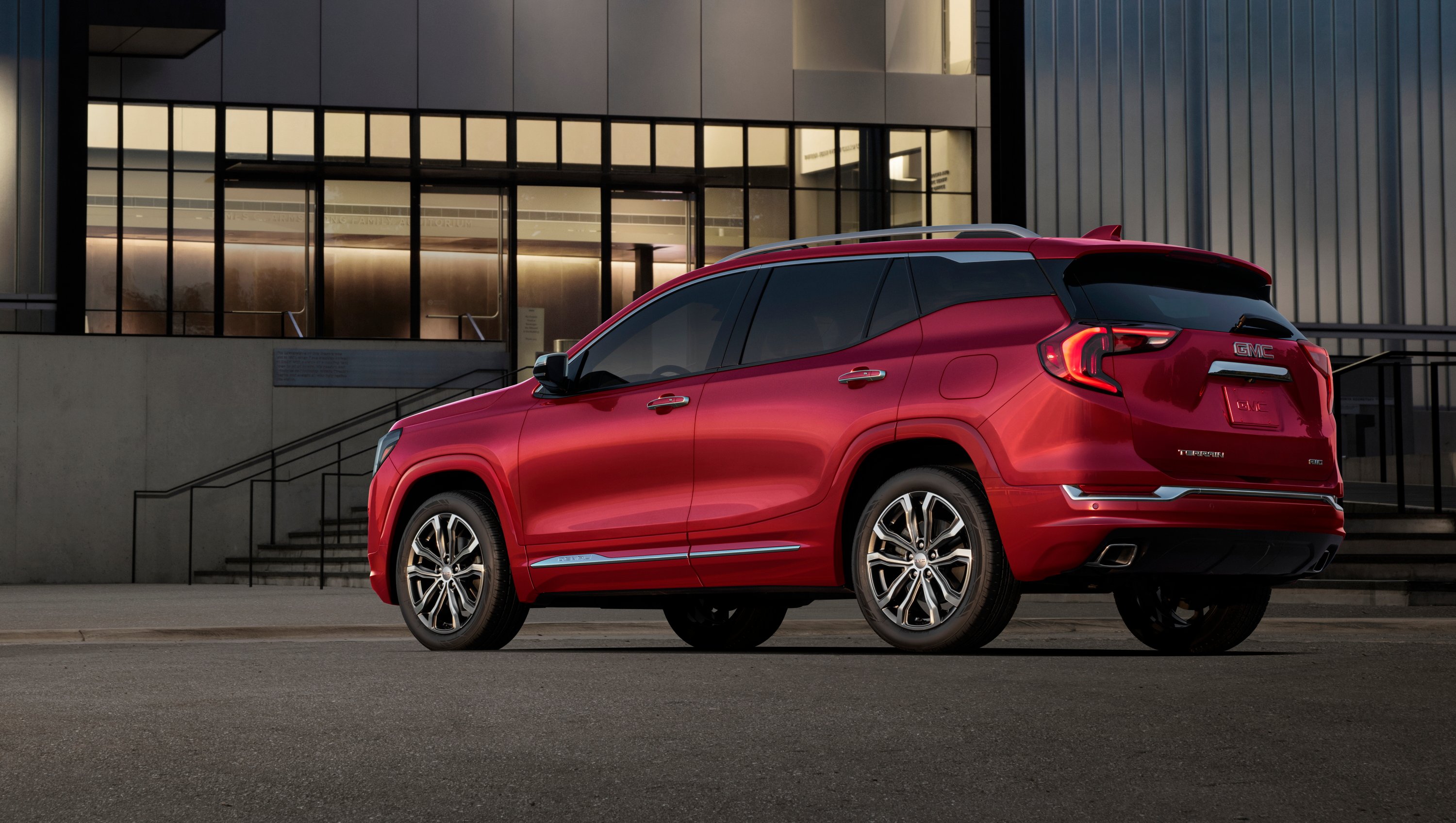 A red 2018 GMC Terrain crossover SUV.