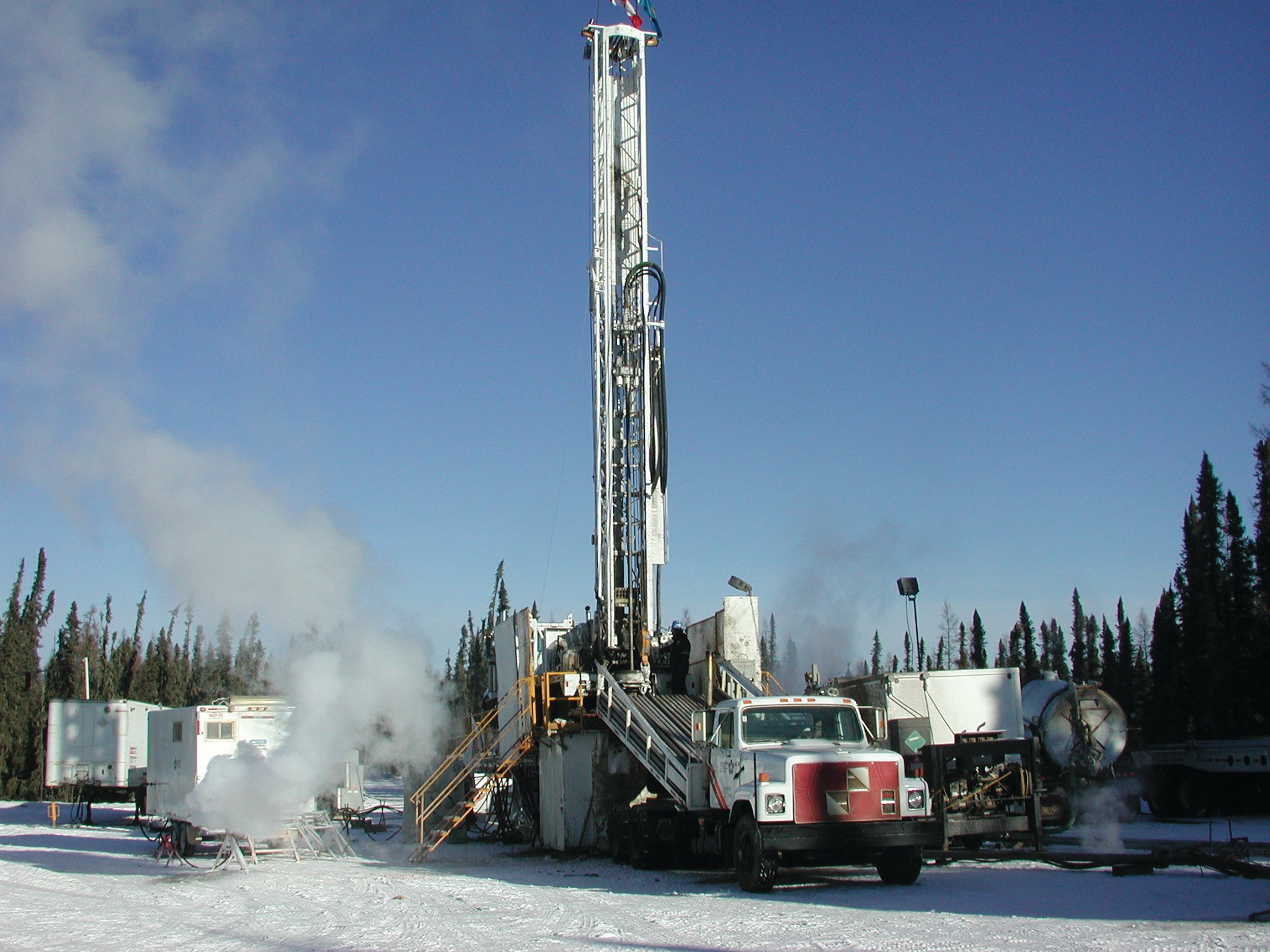 Oil and gas exploration well in winter conditions.