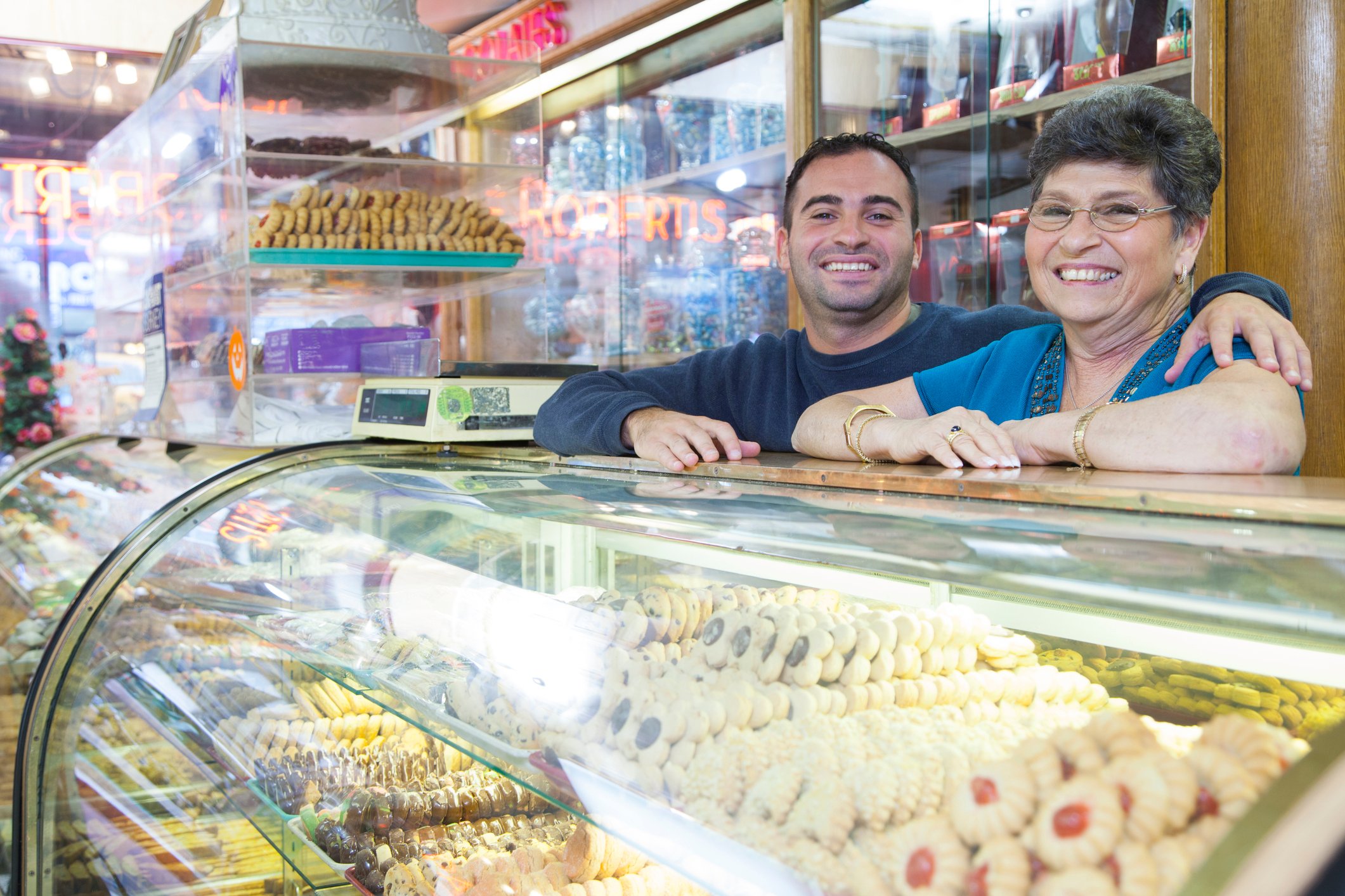 A mom and son in a bakery