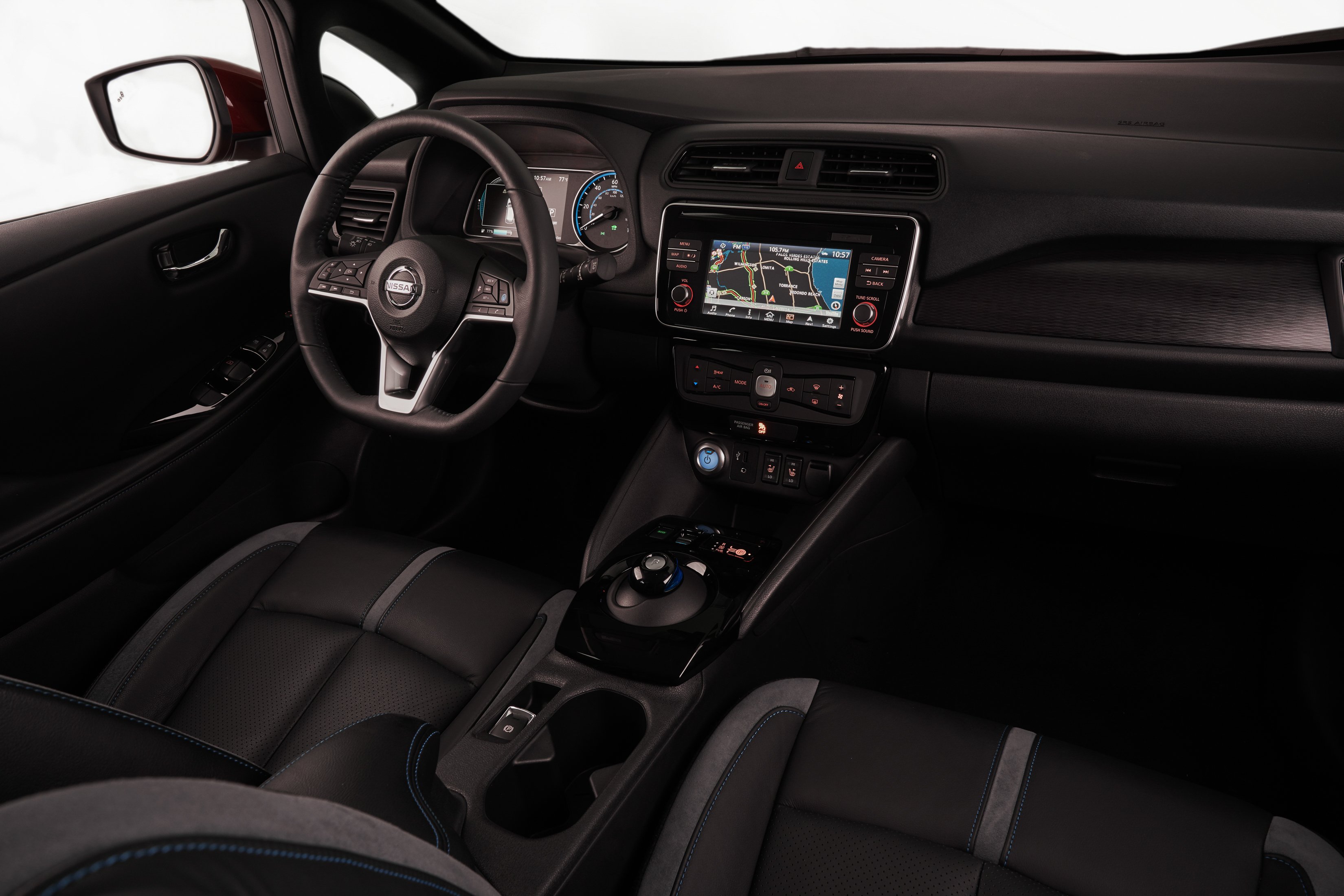 The front seats and dash of the 2018 Nissan Leaf.