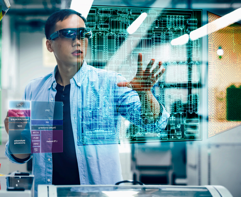 Man wearing glasses working in an AR environment