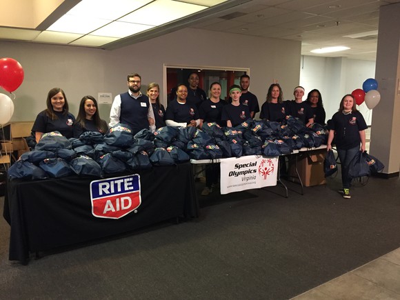 Table with Rite Aid volunteers for Special Olympics.